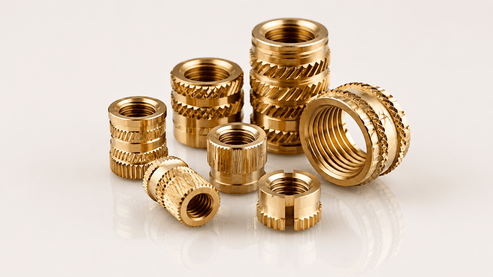Precision brass insert component for plastic molding, manufactured and exported by Pragati Products